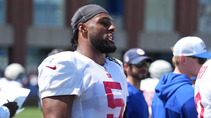 Jul 26, 2024; East Rutherford, NJ, USA; New York Giants linebacker Kayvon Thibodeaux (5) speaks on the sideline during training camp at Quest Diagnostics Training Center.  