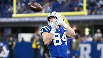 Oct 26, 2025; Indianapolis, Indiana, USA; Indianapolis Colts tight end Tyler Warren (84) warms up before the game against the Tennessee Titans at Lucas Oil Stadium. 