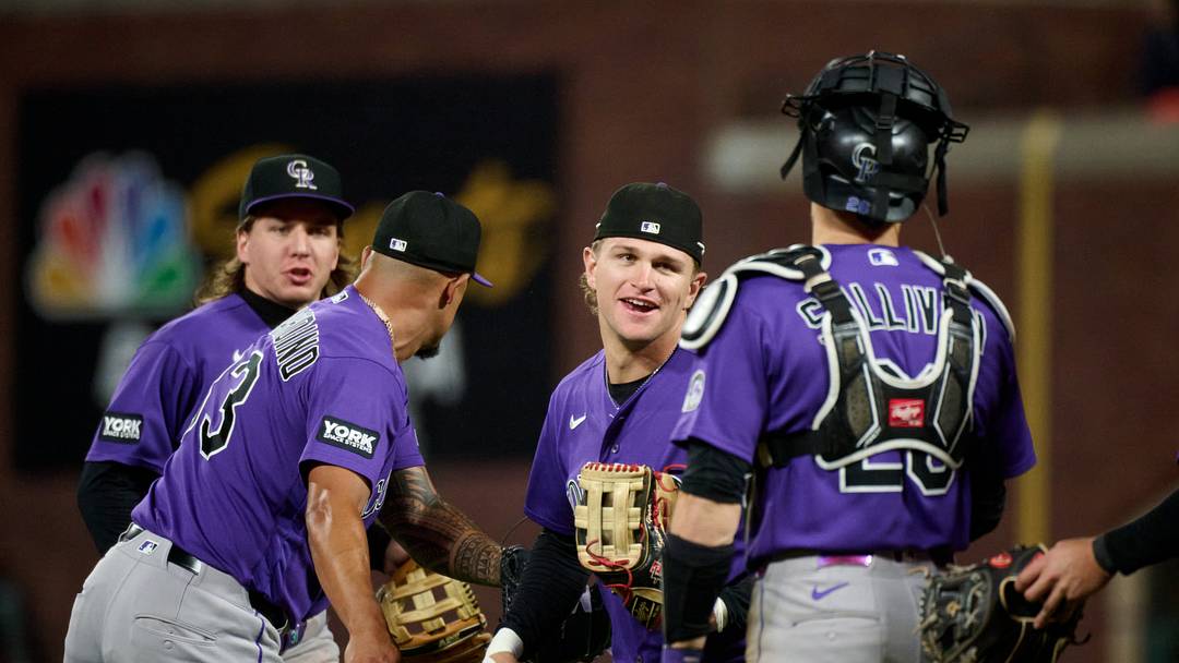 Colorado Rockies outfielder Cole Carrigg (16) celebrates with catcher Brett Sullivan (26) and pitcher Brennan Bernardino (83) Mandatory Credit: Robert Edwards-Imagn Images Colorado Rockies outfielder Cole Carrigg (16) celebrates with catcher Brett Sullivan (26) and pitcher Brennan Bernardino (83) Mandatory Credit: Robert Edwards-Imagn Images