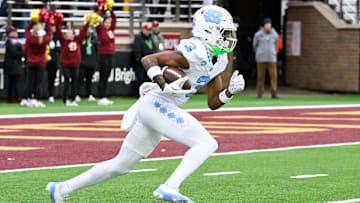 Nov 23, 2024; Chestnut Hill, Massachusetts, USA;  North Carolina Tar Heels wide receiver Chris Culliver (3) runs the ball against the Boston College Eagles during the first half at Alumni Stadium. Mandatory Credit: Eric Canha-Imagn Images