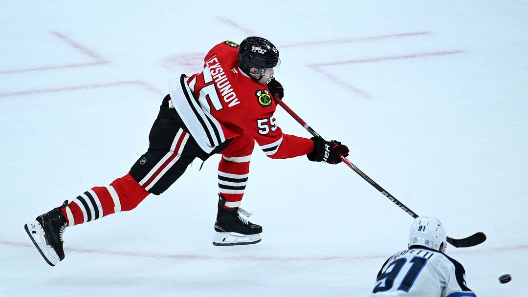 Oct 15, 2026; Chicago, Illinois, USA;  Chicago Blackhawks defenseman Artyom Levshunov (55) scores the game-winning goal during the overtime period against the Winnipeg Jets at the United Center.  Mandatory Credit: Matt Marton-Imagn Images
