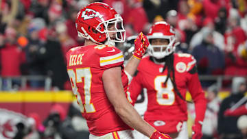 Jan 18, 2025; Kansas City, Missouri, USA; Kansas City Chiefs tight end Travis Kelce (87) reacts after catching a pass for a touchdown against the Houston Texans during the fourth quarter of a 2025 AFC divisional round game at GEHA Field at Arrowhead Stadium. Mandatory Credit: Denny Medley-Imagn Images