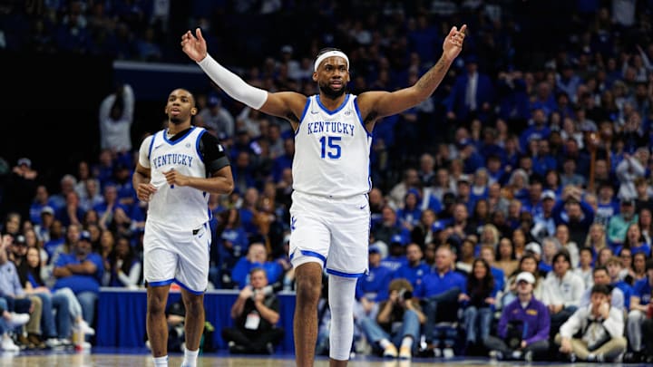 Mar 4, 2025; Lexington, Kentucky, USA; Kentucky Wildcats forward Ansley Almonor (15) reacts after guard Otega Oweh is fouled during the second half against the LSU Tigers at Rupp Arena at Central Bank Center. Mandatory Credit: Jordan Prather-Imagn Images