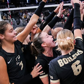 The Purdue Boilermakers celebrate after winning the Monon Spike Match 