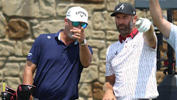 Dustin Johnson gestures on the 11th tee box during a practice round for the U.S. Open golf tournament at Oakmont Country Club