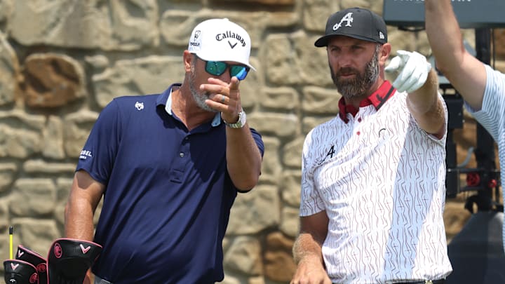 Dustin Johnson gestures on the 11th tee box during a practice round for the U.S. Open golf tournament at Oakmont Country Club Dustin Johnson gestures on the 11th tee box during a practice round for the U.S. Open golf tournament at Oakmont Country Club