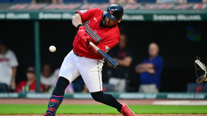 Jun 19, 2024; Cleveland, Ohio, USA; Cleveland Guardians first baseman Josh Naylor (22) hits a home run during the seventh inning against the Seattle Mariners at Progressive Field. Mandatory Credit: Ken Blaze-USA TODAY Sports