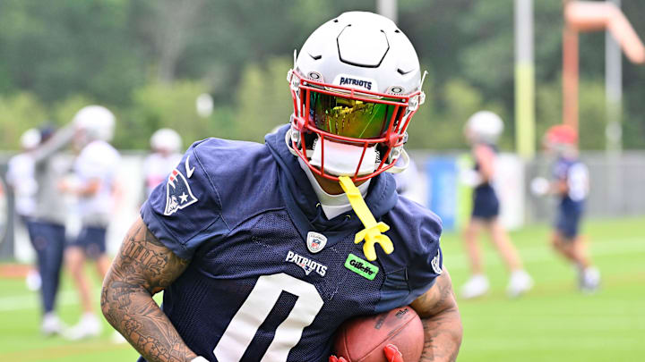 Jun 9, 2025; Foxborough, MA, USA; New England Patriots cornerback Christian Gonzalez (0) runs after the catch during minicamp at Gillette Stadium. Mandatory Credit: Eric Canha-Imagn Images Jun 9, 2025; Foxborough, MA, USA; New England Patriots cornerback Christian Gonzalez (0) runs after the catch during minicamp at Gillette Stadium. Mandatory Credit: Eric Canha-Imagn Images