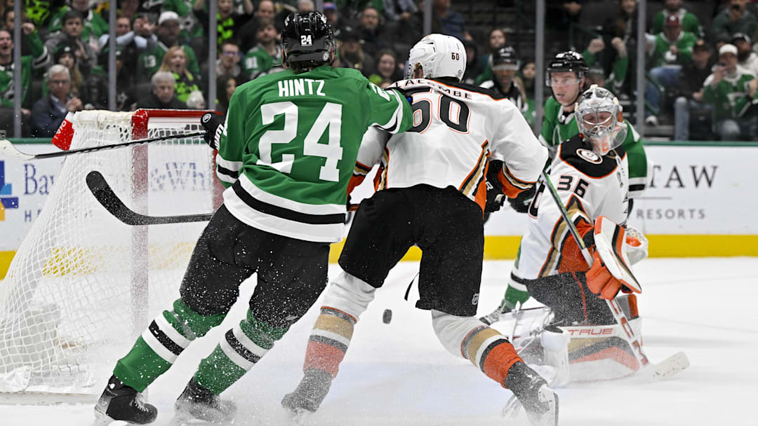 Jan 25, 2024; Dallas, Texas, USA; Dallas Stars defenseman Thomas Harley (55) scores the game winning goal past Anaheim Ducks goaltender John Gibson (36) as Ducks defenseman Jackson LaCombe (60) and Stars center Roope Hintz (24) look on during the overtime period at the American Airlines Center. Mandatory Credit: Jerome Miron-Imagn Images Jan 25, 2024; Dallas, Texas, USA; Dallas Stars defenseman Thomas Harley (55) scores the game winning goal past Anaheim Ducks goaltender John Gibson (36) as Ducks defenseman Jackson LaCombe (60) and Stars center Roope Hintz (24) look on during the overtime period at the American Airlines Center. Mandatory Credit: Jerome Miron-Imagn Images