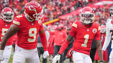 Jan 18, 2025; Kansas City, Missouri, USA; Kansas City Chiefs wide receiver Xavier Worthy (1) celebrates with wide receiver JuJu Smith-Schuster (9) after a play against the Houston Texans during the first half of a 2025 AFC divisional round game at GEHA Field at Arrowhead Stadium.