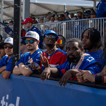 New York Giants fans watch from the sideline during day one of the New York Giants training camp at Quest Diagnostics Giants Training Center in East Rutherford.
