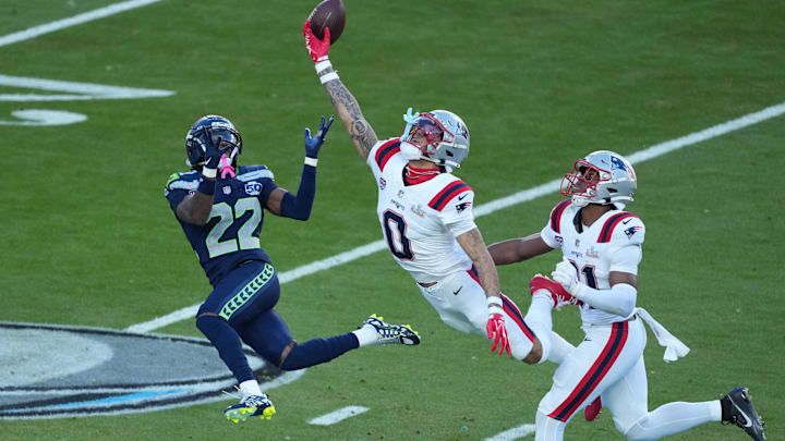 Feb 8, 2026; Santa Clara, CA, USA; New England Patriots cornerback Christian Gonzalez (0) breaks up a pass intended for Seattle Seahawks wide receiver Rashid Shaheed (22) in the first half in Super Bowl LX at Levi's Stadium. Mandatory Credit: Kirby Lee-Imagn Images