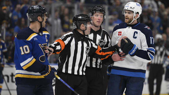Apr 27, 2025; St. Louis, Missouri, USA; St. Louis Blues center Brayden Schenn (10) talks to Winnipeg Jets center Adam Lowry (17) during the third period in game four of the first round of the 2025 Stanley Cup Playoffs at Enterprise Center. Mandatory Credit: Jeff Le-Imagn Images Apr 27, 2025; St. Louis, Missouri, USA; St. Louis Blues center Brayden Schenn (10) talks to Winnipeg Jets center Adam Lowry (17) during the third period in game four of the first round of the 2025 Stanley Cup Playoffs at Enterprise Center. Mandatory Credit: Jeff Le-Imagn Images