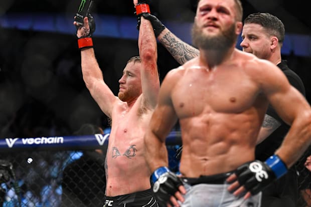 Justin Gaethje celebrates after defeating Rafael Fiziev during UFC 286 at O2 Arena. 