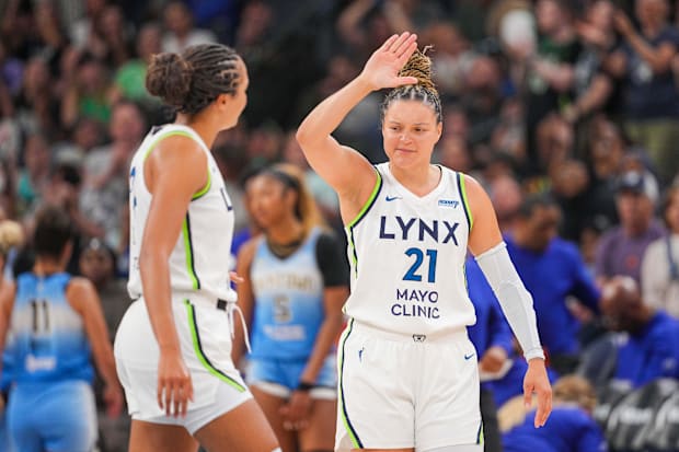 Minnesota Lynx guard Kayla McBride celebrates with forward Napheesa Collier. 