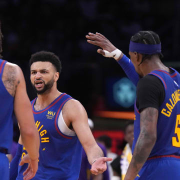 May 20, 2023; Los Angeles, California, USA; Denver Nuggets guard Jamal Murray (27) celebrates with forward Aaron Gordon (50) and guard Kentavious Caldwell-Pope (5) during game three of the Western Conference Finals for the 2023 NBA playoffs against the Los Angeles Lakers at Crypto.com Arena.