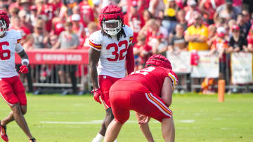 Jul 26, 2024; Kansas City, MO, USA; Kansas City Chiefs center Creed Humphrey (52) prepares to snap the ball as linebacker Nick Bolton (32) defends during training camp at Missouri Western State University. Mandatory Credit: Denny Medley-USA TODAY Sports