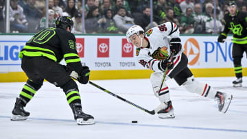 Dec 31, 2023; Dallas, Texas, USA; Chicago Blackhawks center Connor Bedard (98) and Dallas Stars