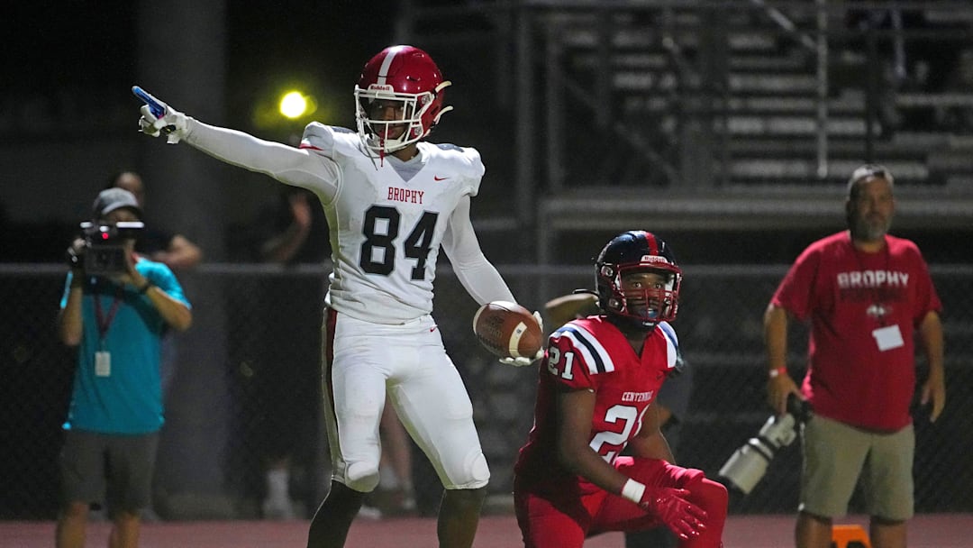 Brophy Prep wide receiver Daylen Sharper (84) celebrates a first down against Centennial during a game at Centennial High School on Sept. 13, 2024.