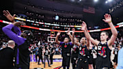 Apr 9, 2025; Toronto, Ontario, CAN; Toronto Raptors forward Scottie Barnes (4) and guard A.J. Lawson (0) acknowledge the crowd after a game against the Charlotte Hornets at Scotiabank Arena. Mandatory Credit: Nick Turchiaro-Imagn Images
