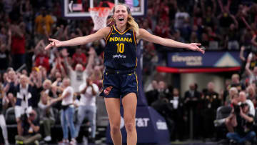 Indiana Fever guard Lexie Hull (10) celebrates after scoring a three-point field goal during the second half of a game against the Seattle Storm on Sunday, Aug. 18, 2024, at Gainbridge Fieldhouse in Indianapolis. The Fever defeated the Storm 92-75.