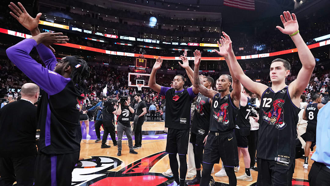 Apr 9, 2025; Toronto, Ontario, CAN; Toronto Raptors forward Scottie Barnes (4) and guard A.J. Lawson (0) acknowledge the crowd after a game against the Charlotte Hornets at Scotiabank Arena. Mandatory Credit: Nick Turchiaro-Imagn Images