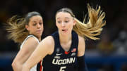 Connecticut Huskies guard Paige Bueckers dribbles the ball against the Iowa Hawkeyes in the semifinals of the Final Four of the 2024 NCAA Women's Tournament at Rocket Mortgage FieldHouse.