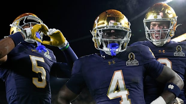 Jeremiyah Love celebrates a touchdown in the 2024 College Football Playoff game against Indian