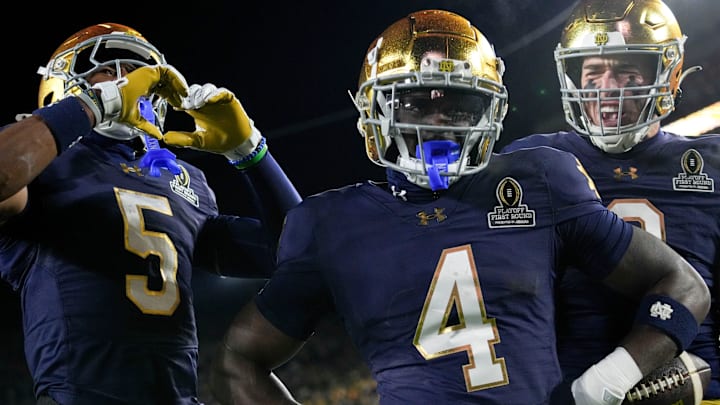 Notre Dame Fighting Irish running back Jeremiyah Love (4) celebrates after scoring a touchdown during the first half against Indiana.