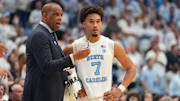 Nov 7, 2025; Chapel Hill, North Carolina, USA;  North Carolina Tar Heels head coach Hubert Davis with guard Seth Trimble (7) in the second half at Dean E. Smith Center. Mandatory Credit: Bob Donnan-Imagn Images