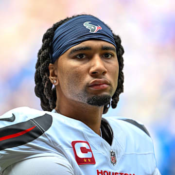 Sep 8, 2024; Indianapolis, Indiana, USA; Houston Texans quarterback C.J. Stroud (7) stands on the sidelines before the game against the Indianapolis Colts at Lucas Oil Stadium. Mandatory Credit: Marc Lebryk-Imagn Images