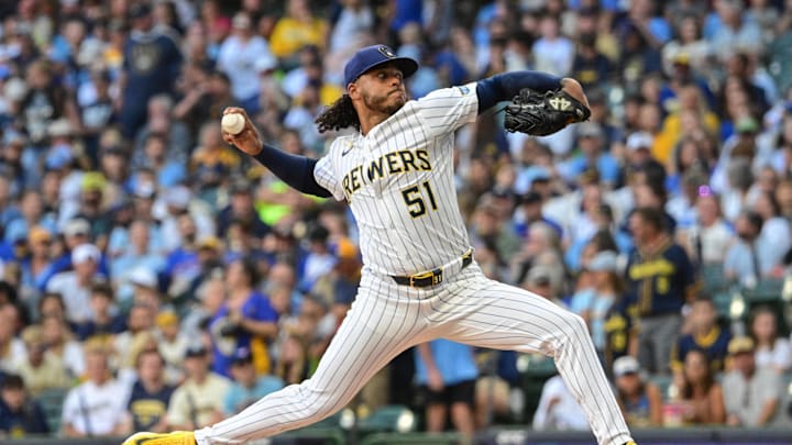 Aug 23, 2025; Milwaukee, Wisconsin, USA;  Milwaukee Brewers starting pitcher Freddy Peralta (51) throws a pitch in the first inning against the San Francisco Giants at American Family Field. Mandatory Credit: Benny Sieu-Imagn Images
