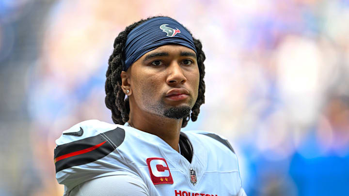 Sep 8, 2024; Indianapolis, Indiana, USA; Houston Texans quarterback C.J. Stroud (7) stands on the sidelines before the game against the Indianapolis Colts at Lucas Oil Stadium. Mandatory Credit: Marc Lebryk-Imagn Images