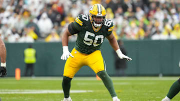 Oct 13, 2024; Green Bay, Wisconsin, USA;  Green Bay Packers offensive linenam Zach Tom (50) during the game against the Arizona Cardinals at Lambeau Field. Mandatory Credit: Jeff Hanisch-Imagn Images