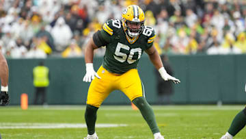 Oct 13, 2024; Green Bay, Wisconsin, USA;  Green Bay Packers offensive linenam Zach Tom (50) during the game against the Arizona Cardinals at Lambeau Field. Mandatory Credit: Jeff Hanisch-Imagn Images