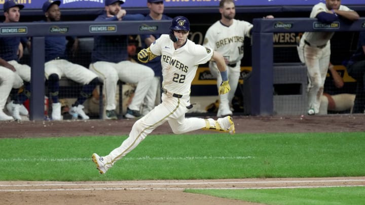 Milwaukee Brewers outfielder Christian Yelich (22) runs after hitting a single during their game against the Pittsburgh Pirates Tuesday, July 9, 2024 at American Family Field in Milwaukee, Wisconsin.