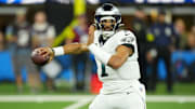 Dec 8, 2025; Inglewood, California, USA;  Philadelphia Eagles quarterback Jalen Hurts (1) passes against the Los Angeles Chargers in the first half at SoFi Stadium. Mandatory Credit: Kirby Lee-Imagn Images