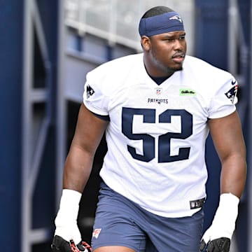 Jun 9, 2025; Foxborough, MA, USA; New England Patriots offensive tackle Marcus Bryant (52) walks to the practice fields at Gillette Stadium. Mandatory Credit: Eric Canha-Imagn Images