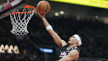Mar 12, 2025; Portland, Oregon, USA; Portland Trail Blazers forward Toumani Camara (33) shoots the ball during the first half against the New York Knicks at Moda Center. Mandatory Credit: Soobum Im-Imagn Images