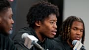 Bearcats new transfer defensive backs (left to right) Kye Stokes, Jared Bartlett and Derrick Canteen take questions during a press conference at the University of Cincinnati   s Fifth Third Arena in Cincinnati on Tuesday, Feb. 13, 2024.