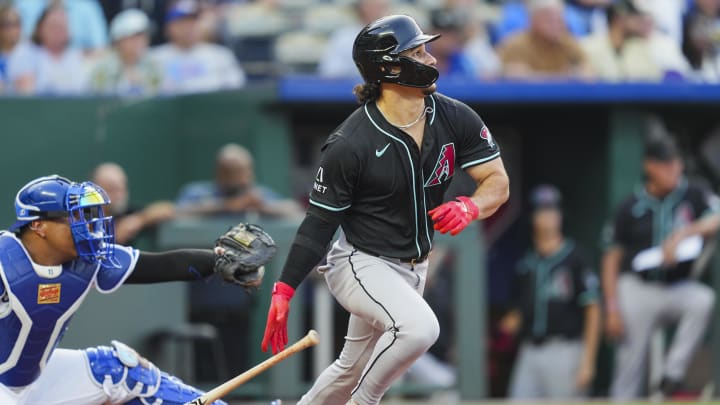 Jul 22, 2024; Kansas City, Missouri, USA; Arizona Diamondbacks center fielder Alek Thomas (5) hits an RBI double against the Kansas City Royals during the third inning at Kauffman Stadium. Mandatory Credit: Jay Biggerstaff-USA TODAY Sports