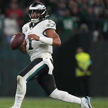 Sep 6, 2024; Sao Paulo, BRA; Philadelphia Eagles quarterback Jalen Hurts (1) scrambles during the first half against the Green Bay Packers at Neo Quimica Arena. Mandatory Credit: Kirby Lee-Imagn Images