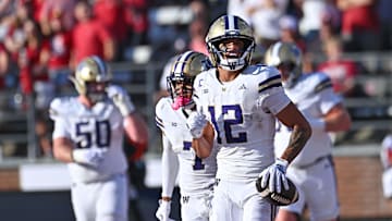 Sep 20, 2025; Pullman, Washington, USA; Washington Huskies wide receiver Denzel Boston (12) celebrate a touchdown against the Washington State Cougars in the first half of Apple Cup at Gesa Field at Martin Stadium. Mandatory Credit: James Snook-Imagn Images