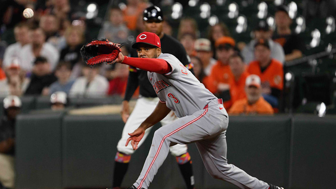 Apr 18, 2025; Baltimore, Maryland, USA; Cincinnati Reds third baseman Jeimer Candelario (3) catches the ball during the third inning against the Baltimore Orioles at Oriole Park at Camden Yards. Mandatory Credit: Reggie Hildred-Imagn Images