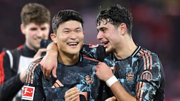 Kim Min-jae and Aleksandar Pavlovic celebrating Bayern Munich's win against Freiburg.