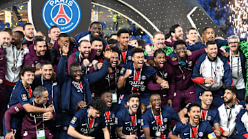 PSG players and staff on the podium following their Trophée des Champions triumph 