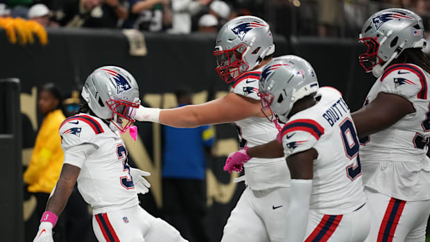 New England Patriots wide receiver Demario Douglas (3) celebrates a touchdown.