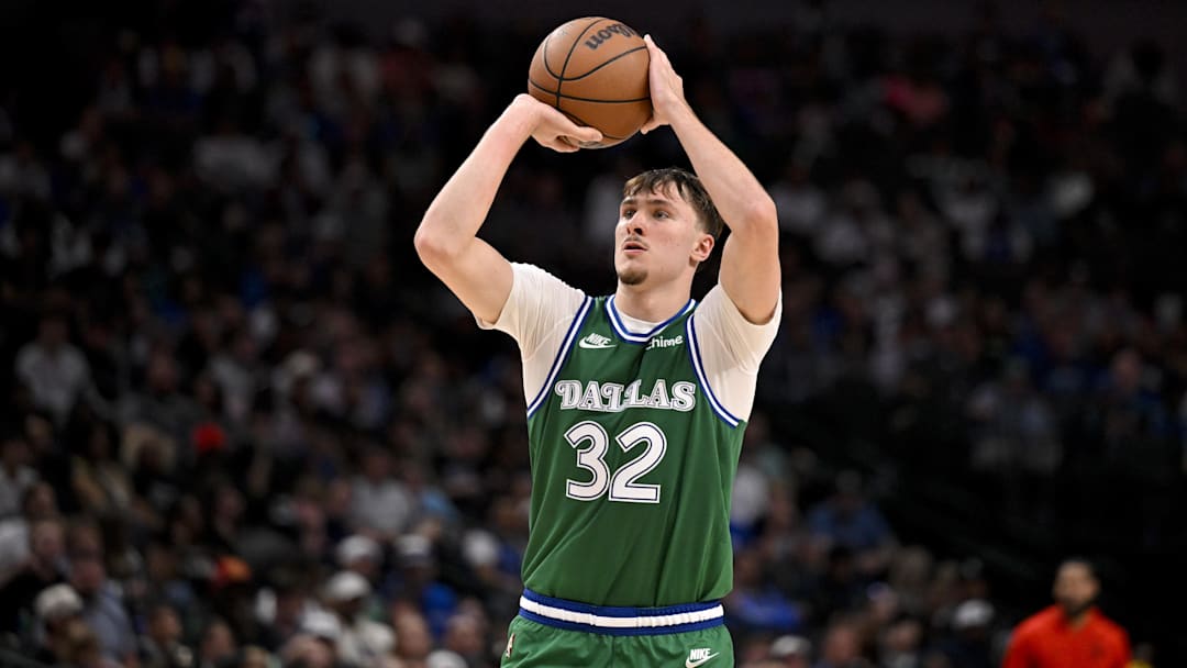 Oct 26, 2025; Dallas, Texas, USA; Dallas Mavericks forward Cooper Flagg (32) makes a three-point shot against the Toronto Raptors during the second half at the American Airlines Center.