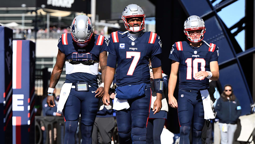 Oct 27, 2024; Foxborough, Massachusetts, USA; New England Patriots quarterback Joe Milton III (19), quarterback Jacoby Brissett (7), and quarterback Drake Maye (10) walk onto the field before a game against the New York Jets at Gillette Stadium. Mandatory Credit: Brian Fluharty-Imagn Images