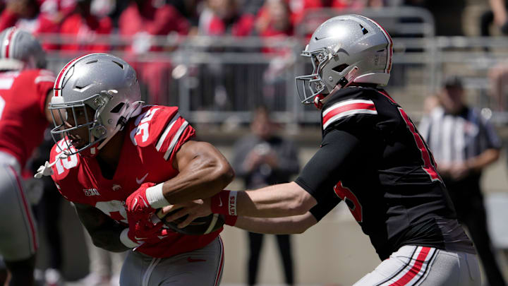 April 13, 2024; Columbus, Ohio, USA; 
Ohio State Buckeyes quarterback Julian Sayin (10) hands off to
